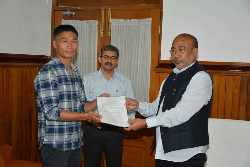 CM HANDS OVER APPOINTMENT ORDER TO KARIO ISSAC MAHEO